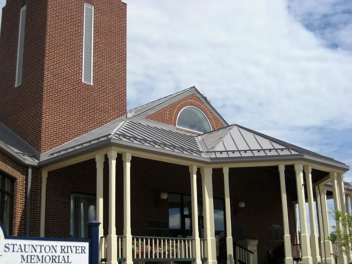 Skilled roofing craftsmen working on a residential roof in Six Corners